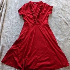 Red dress with ruffle detail and pockets